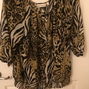 Verona animal print top with steaks of gold. Size large.